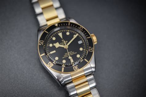 tudor black bay gold steel